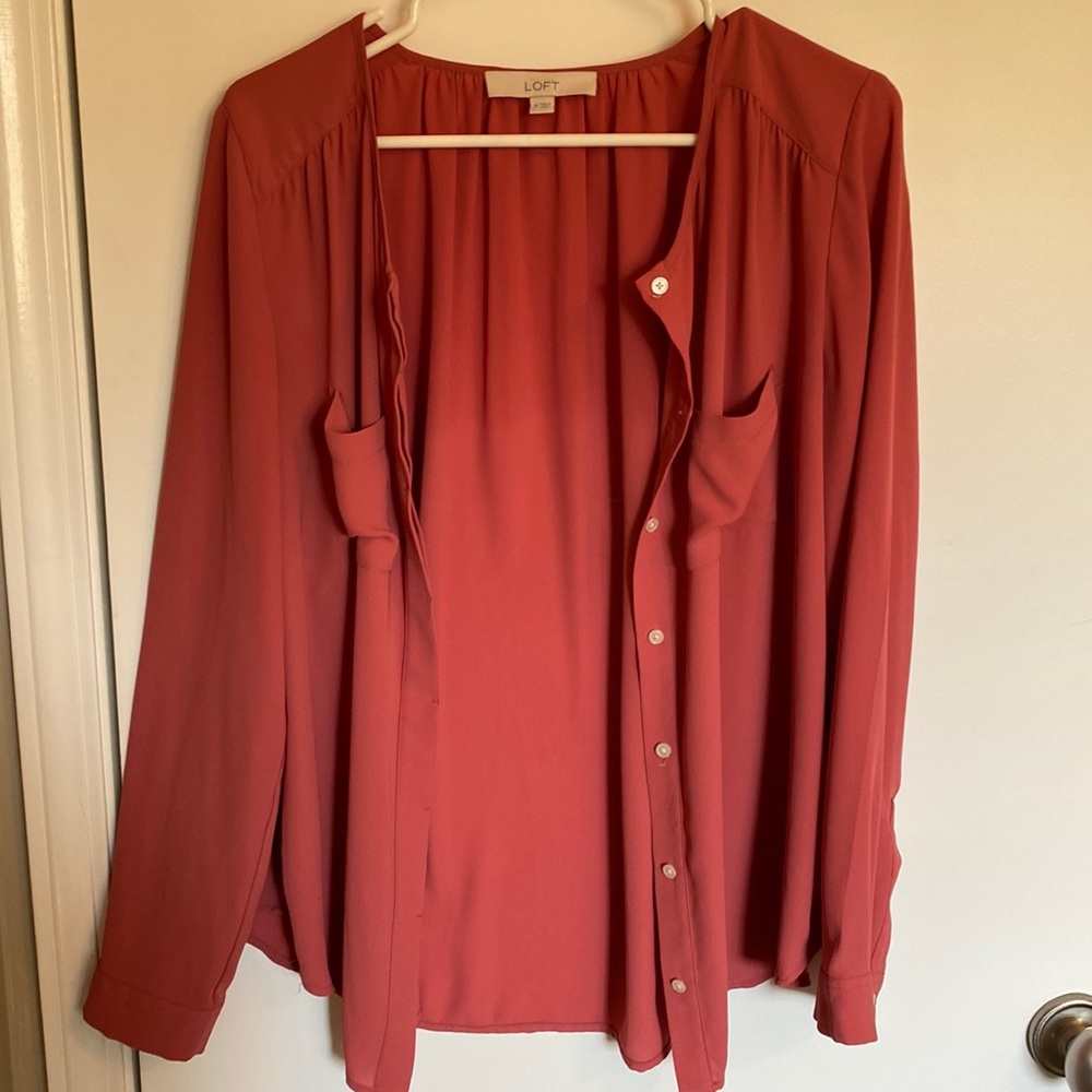 Adorable button-up blouse.